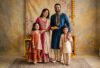 Indian family wearing coordinated family outfits for Indian festivals